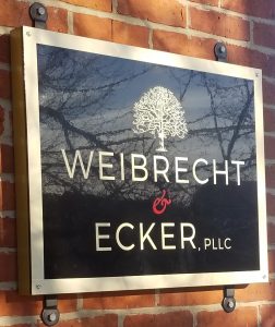 Weibrecht & Ecker Logo